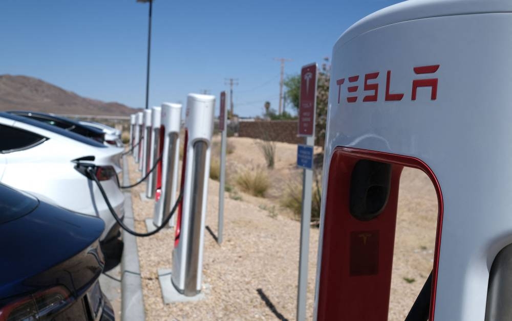 Tesla reported a better-than-expected US$2.3 billion in second-quarter earnings on July 20, 2022, despite a hit from Covid-19 lockdowns in Shanghai that weighed on profit margins. ― AFP pic