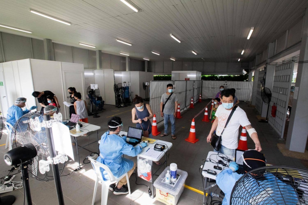 In overseeing the delivery of Covid-19 tests, 5,100 swab personnel had to be hired and trained within three months, the Health Promotion Board said. — TODAY pic