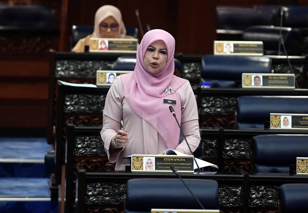 Women, Family and Community Development Minister Datuk Seri Rina Harun speaks at the Dewan Rakyat in Kuala Lumpur July 19, 2022. — Bernama pic