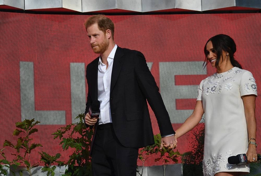 Prince Harry and Meghan Markle, the Duke and Duchess of Sussex, both feature in the top three sexiest royal family members, according to Twitter users. ― AFP pic