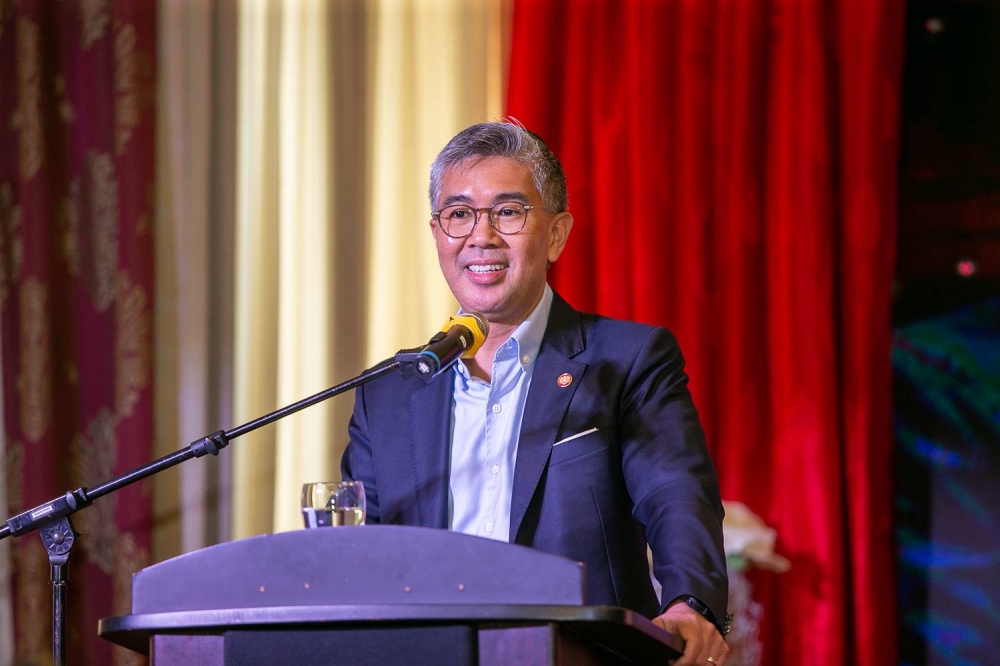 Finance Minister Senator Datuk Seri Tengku Zafrul Abdul Aziz gives his official speech during the Education Office Excellence Service Award 2021 at One Plaza, Kuala Selangor July 8, 2022. — Picture by Devan Manuel