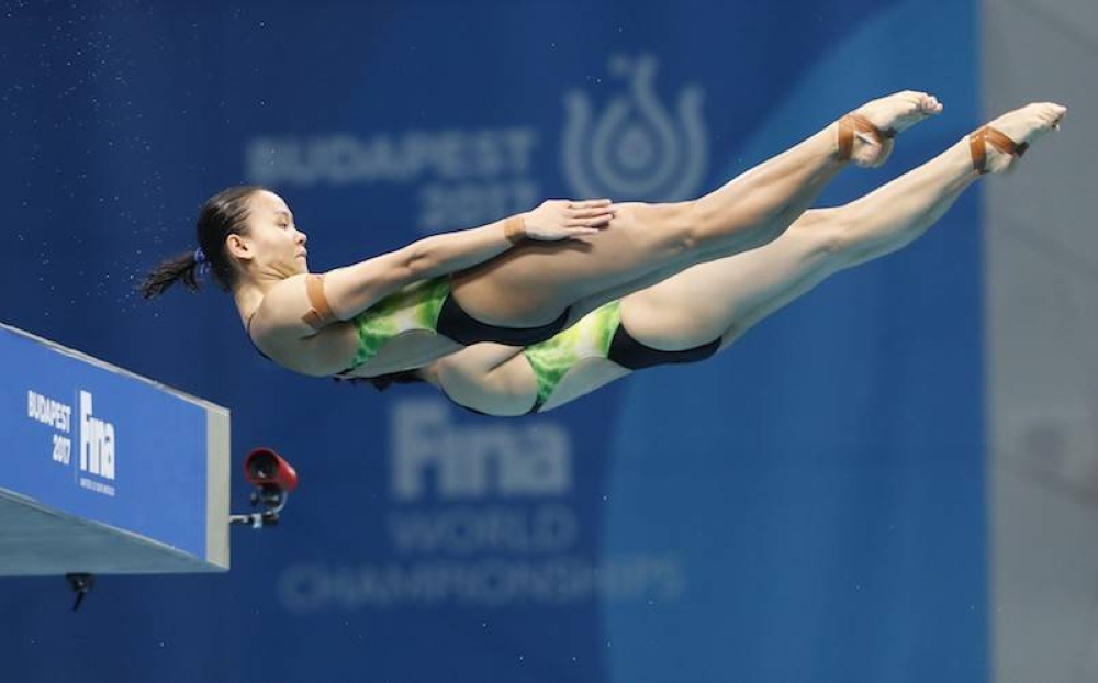 Jun Hoong Cheong and Pandelela Rinong of Malaysia compete in the 10m Platform Synchro Women preliminary at the 17th Fina World Aquatics Championships in Hungary in this file photo taken on July 16, 2017. Deputy Youth and Sports Minister Datuk Seri Ti Lian Ker said the absence of the women’s diving event at the 20th Malaysian Games (Sukma) is due to the technical rule of minimum participation in the Games. — Reuters pic