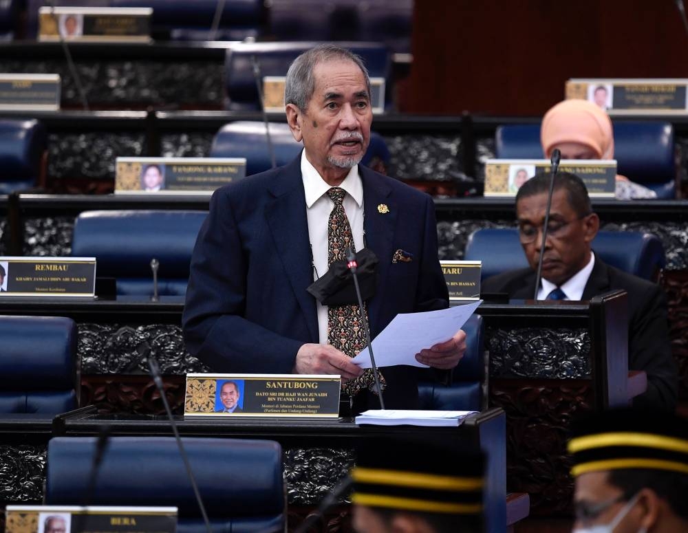 Minister in the Prime Minister's Department (Parliament and Law) and Santubong Member of Parliament Datuk Seri Dr Wan Junaidi Tuanku Jaafar answering questions at the Second Meeting of the Fifth Term of the 14th Parliament for the Dewan Rakyat, July 18, 2022. — Bernama pic