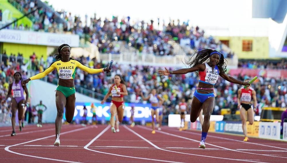 Twanisha Terry of the US wins the women's 4x100 metres relay final ahead of second placed Jamaica's Shericka Jackson. — Reuters pic