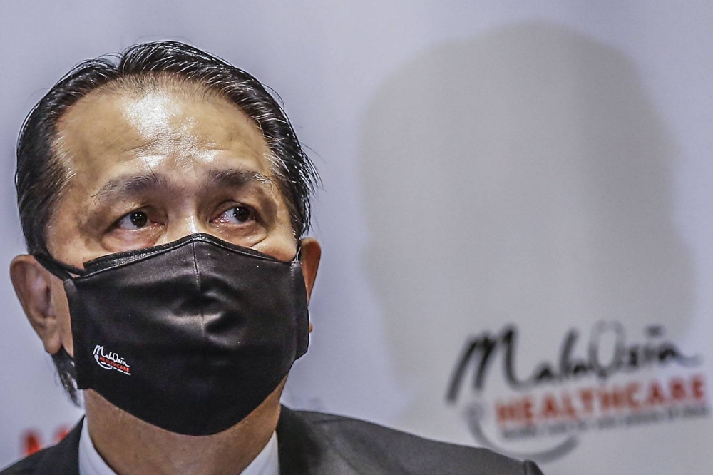 Health director-general Tan Seri Dr Noor Hisham Abdullah speaks at the press conference at Mandarin Oriental Hotel November 16, 2021. ― Picture by Hari Anggara.