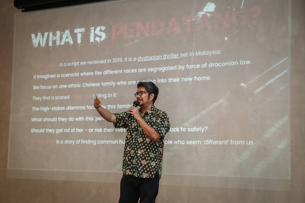 'Pendatang' co-producer Amir Muhammad speaks during the crowdfunding media briefing at the Grey Box in Kuala Lumpur July 24, 2022. — Picture by Yusof Mat Isa