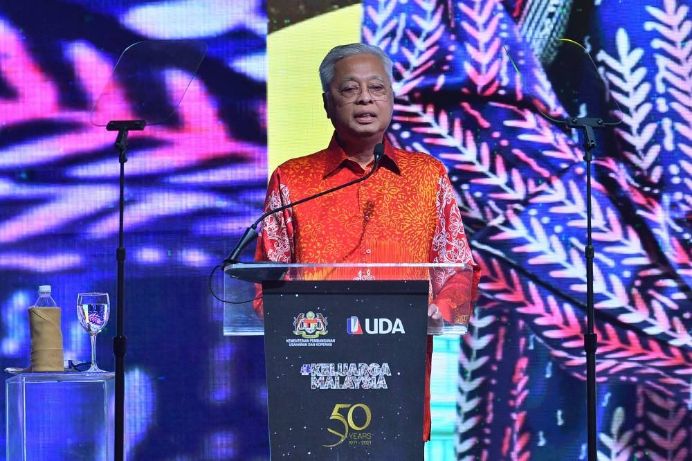 Prime Minister Datuk Seri Ismail Sabri Yaakob delivers a speech during the gala dinner in conjunction with the 50th anniversary of UDA Holdings Berhad in Kuala Lumpur, July 25, 2022. — Bernama pic 