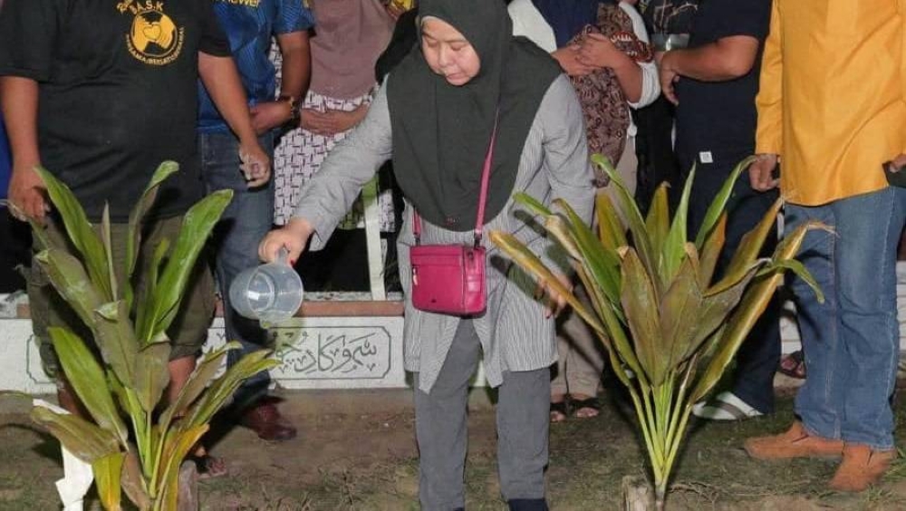 More than 100 family members and friends attended Muhammad Iman Aqmar’s funeral which was held at about 1am today. — Picture via Facebook