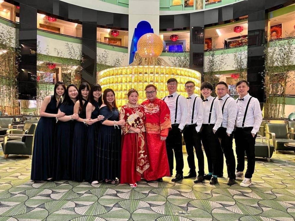 While some might find it taboo to mark happy occasions at a funeral home, the couple say that family and friends were supportive of their wedding venue. —Pictures via Facebook/ Nirvana Memorial Garden Singapore
