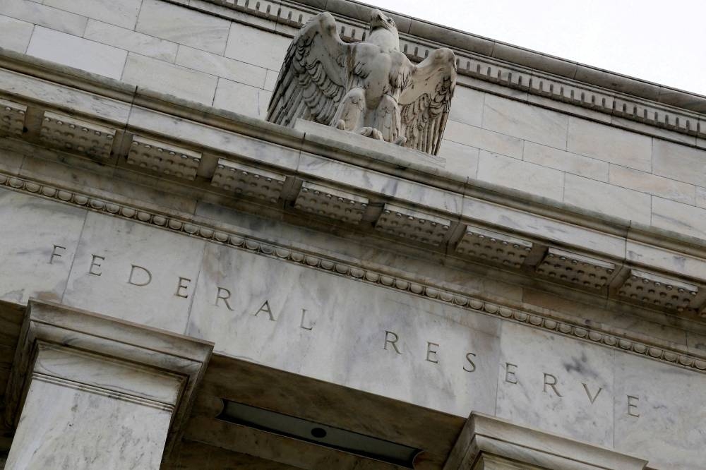 An eagle tops the U.S. Federal Reserve building's facade in Washington, July 31, 2013. — Reuters pic