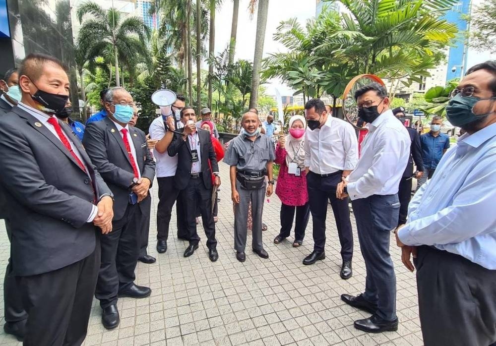 Yesterday, KKLTAT was reported holding a picket from 1pm to 2pm at the LTAT Building area, Jalan Bukit Bintang, claiming that LTAT did not look after the welfare of its staff. — Picture from Twitter/Hishammuddin Hussein 
