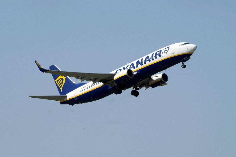 Ryanair aircraft Boeing 737-8AS takes off from Riga International Airport, Latvia July 21, 2022. — Reuters pic