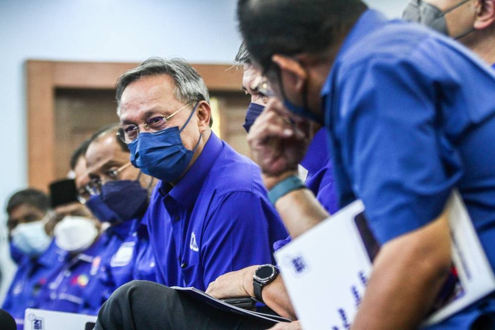 A Johor Umno source, closely linked to the party’s state leadership, said the proposal for Datuk Seri Hasni Mohammad (centre) to either contest in Pontian or Tanjung Piai was made following several considerations. — Picture by Hari Anggara