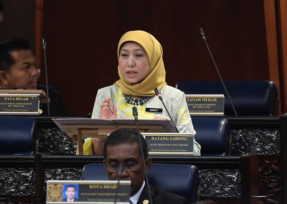 Tourism Minister Datuk Seri Nancy Shukri addresses members of Parliament in Kuala Lumpur July 26, 2022. — Bernama pic