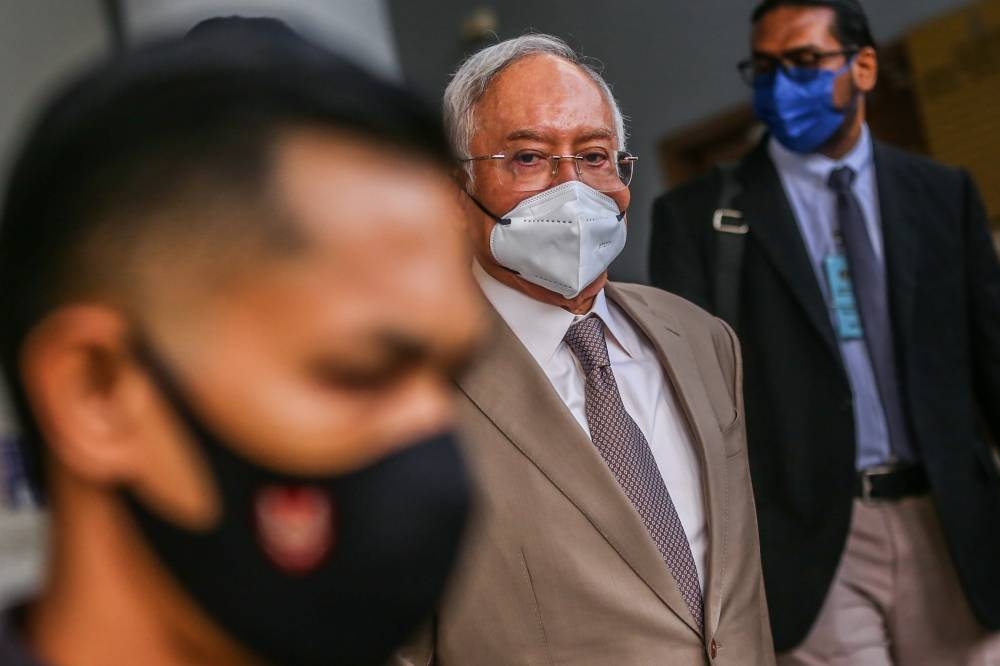Former Prime Minister Datuk Seri Najib Razak at the Kuala Lumpur High Court Complex June 21, 2022. — Picture by Hari Anggara