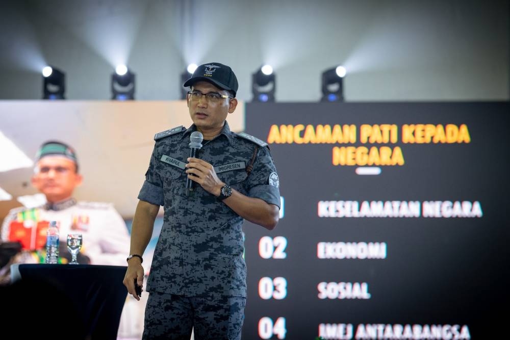 Immigration Department director-general Datuk Khairul Dzaimee Daud speaks during the 'Kita Demi Negara' roadshow in Batu Kurau, Perak, July 24, 2022. — Picture courtesy of Home Ministry/Facebook