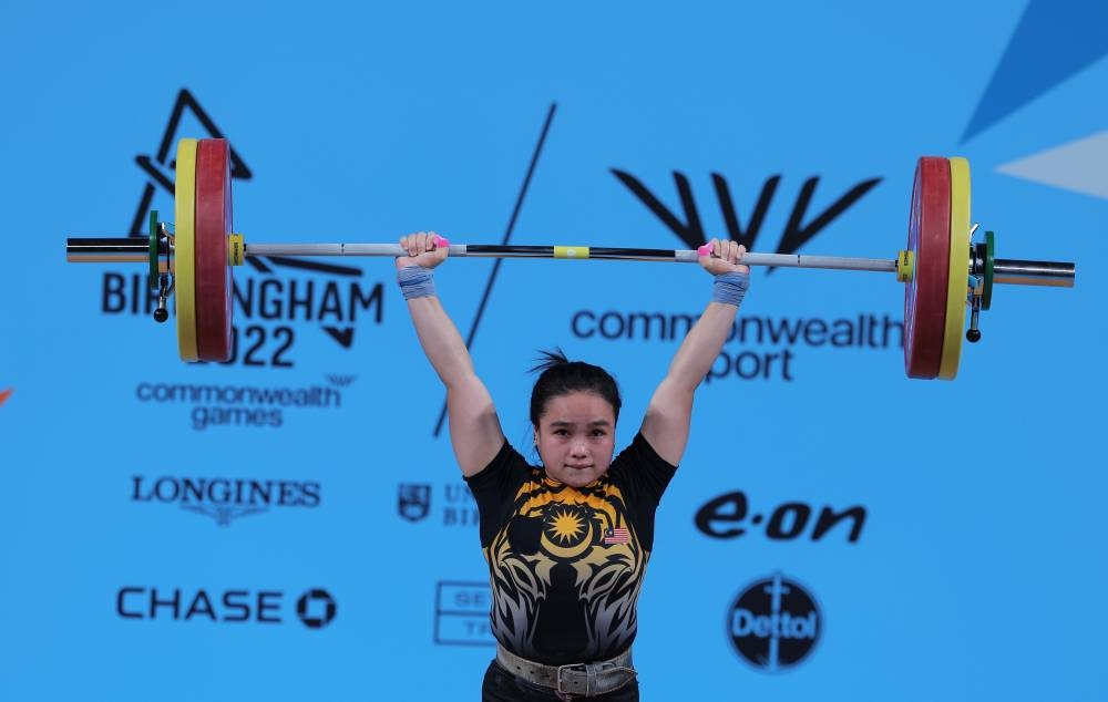 National woman weightlifter Marceeta Marlyne Marcus in action during the clean & jerk event, Birmingham July 31, 2022. — Bernama pic