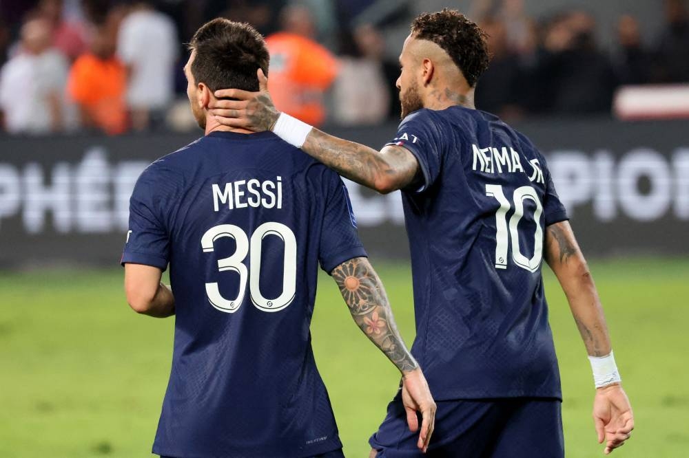 Paris Saint-Germain's Argentinian forward Lionel Messi and Paris Saint-Germain's Brazilian forward Neymar celebrate the team's win in the French Champions' Trophy, in Tel Aviv July 31, 2022. — AFP pic