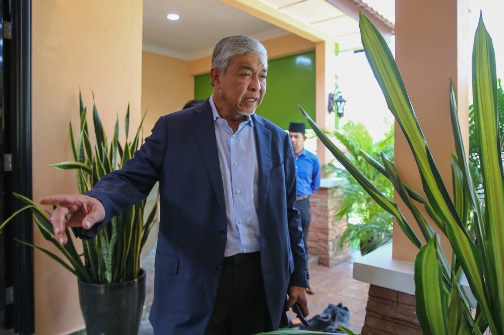 Seen here at Yayasan Al-Falah, Datuk Seri Ahmad Zahid Hamidi is facing 47 charges, namely 12 counts of criminal breach of trust in relation to RM31 million of charitable foundation Yayasan Akalbudi’s funds, 27 counts of money-laundering, and eight counts of bribery charges.