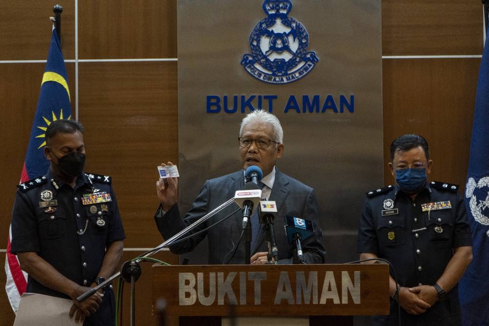 Home Minister Datuk Seri Hamzah Zainudin warns the public against hindering police officers from carrying out their duties. — Picture by Shafwan Zaidon