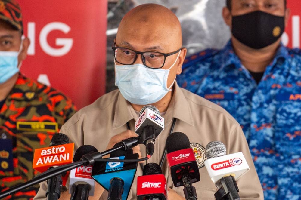 National Disaster Management Agency (Nadma) director-general Datuk Aminuddin Hassim speaks to the media during the Ops Banjir press conference at Nadma operation centre in Shah Alam December 23, 2021. — Picture by Shafwan Zaidon  