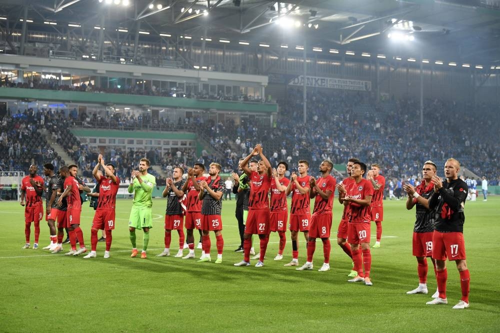  Eintracht Frankfurt players celebrate after the match against Magdeburg at the MDCC-Arena, Magdeburg August 1, 2022. — Reuters pic