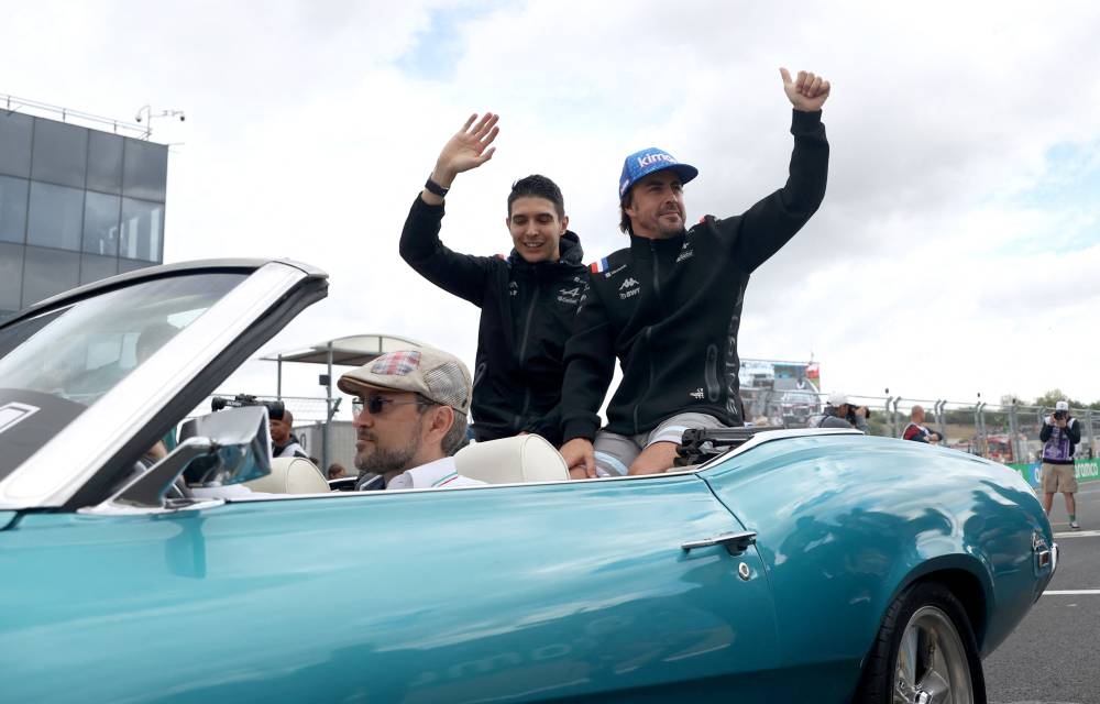 Alpine's Fernando Alonso and Esteban Ocon during the drivers' parade before the Hungarian Grand Prix in Budapest July 31, 2022. — Reuters pic