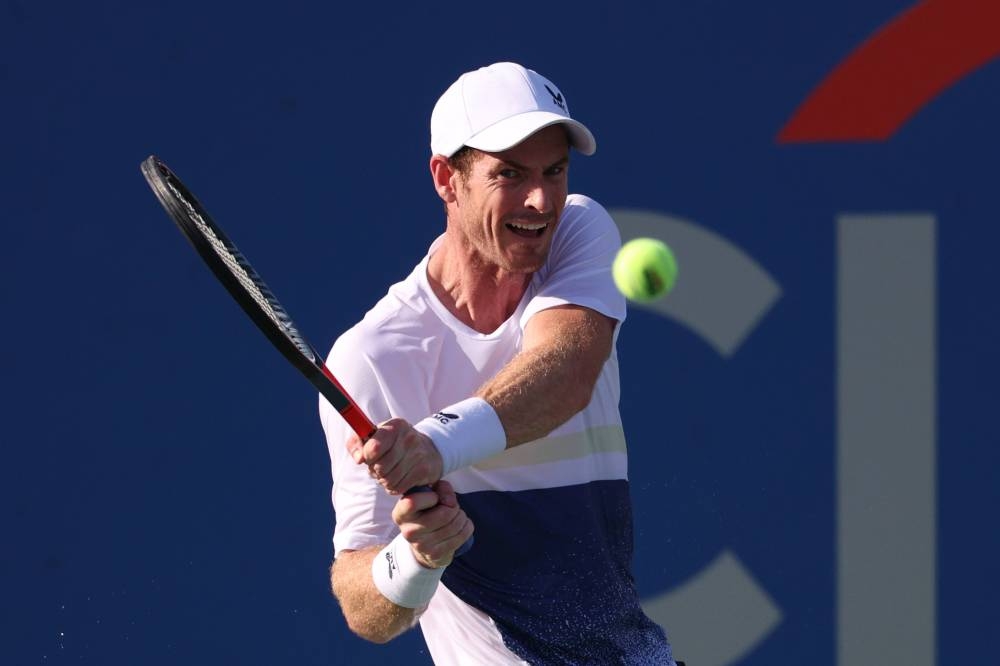 Andy Murray returns a shot to Mikael Ymer at the Rock Creek Tennis Centre on August 1, 2022 in Washington, DC. — AFP pic