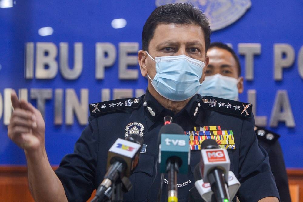 KL police chief Datuk Azmi Abu Kassim speaks during a press conference at IPK Kuala Lumpur June 20, 2022. — Picture by Miera Zulyana