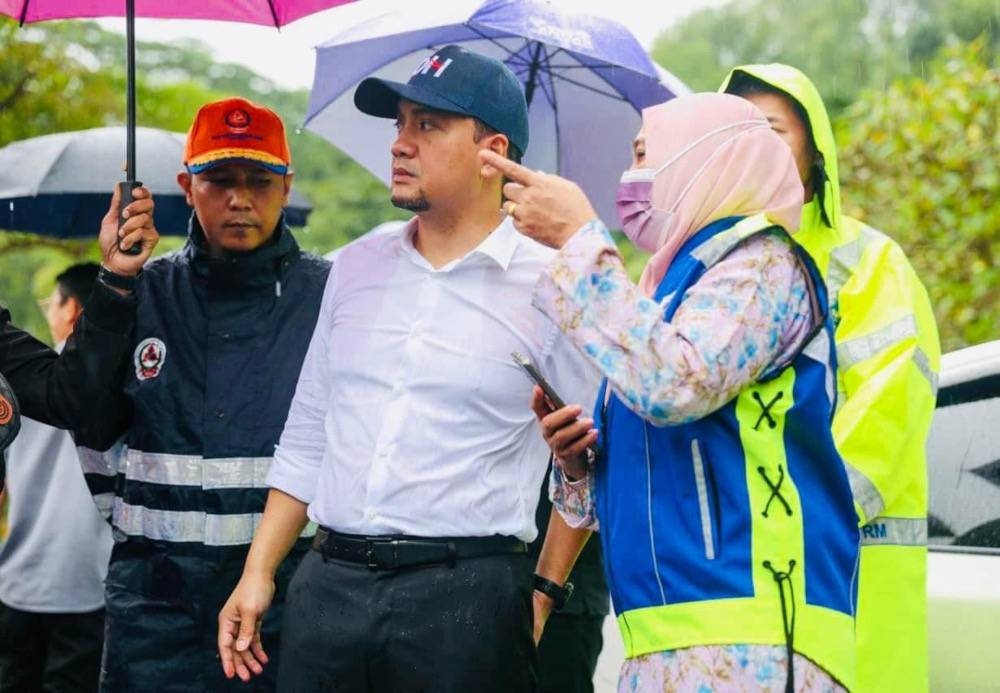 Johor Mentri Besar Datuk Onn Hafiz Ghazi (centre) being briefed on the areas affected by flash floods in Johor Baru, August 2, 2022. — Picture courtesy of Johor Mentri Besar’s office