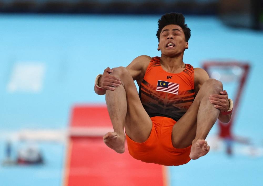 Malaysia's Muhammad Sharul Aimy in action in the men’s vault event at Arena Birmingham, Birmingham, Britain, August 2, 2022. — Reuters pic 