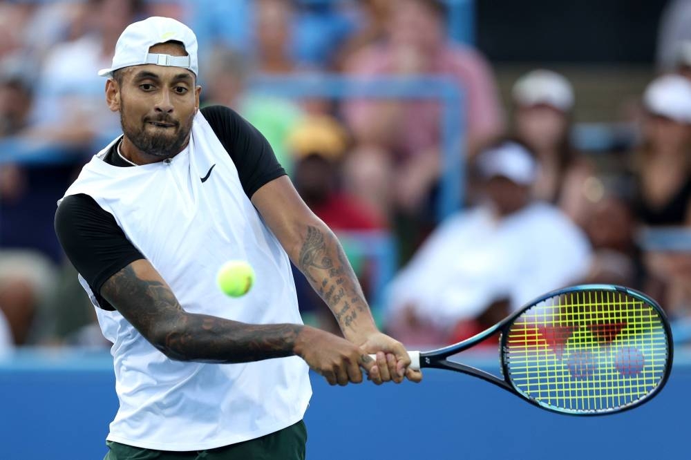 Nick Kyrgios plays a shot against Marcos Giron at the Rock Creek Tennis Centre in Washington August 2, 2022. — AFP pic