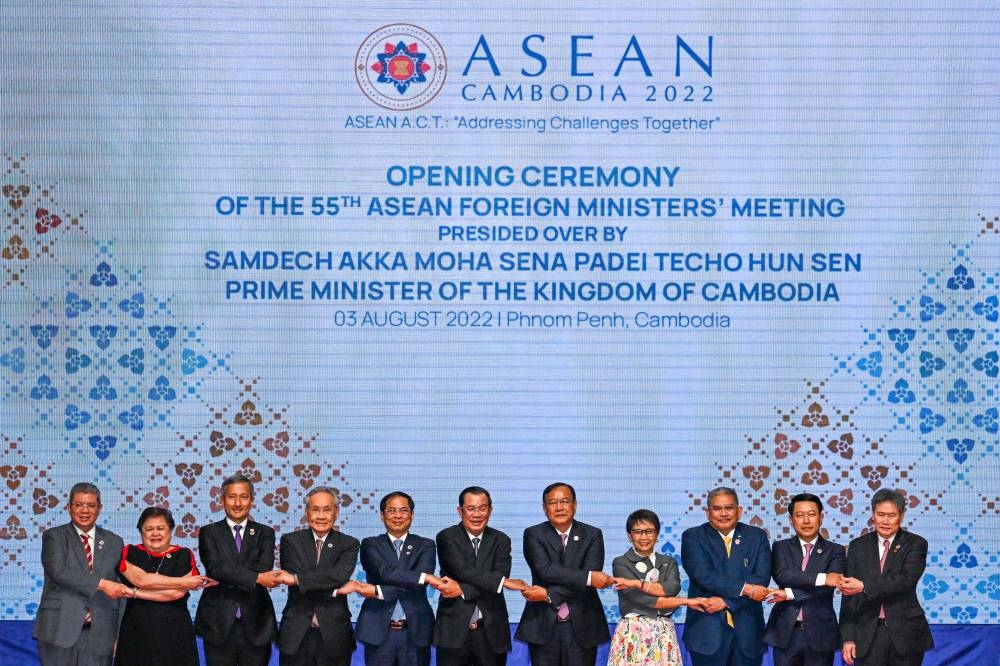 Malaysia’s Foreign Minister Saifuddin Abdullah (left) and other Asean foreign ministers at the opening ceremony for the 55th Asean Foreign Ministers Meeting in Phnom Penh, August 3, 2022. — AFP pic 
