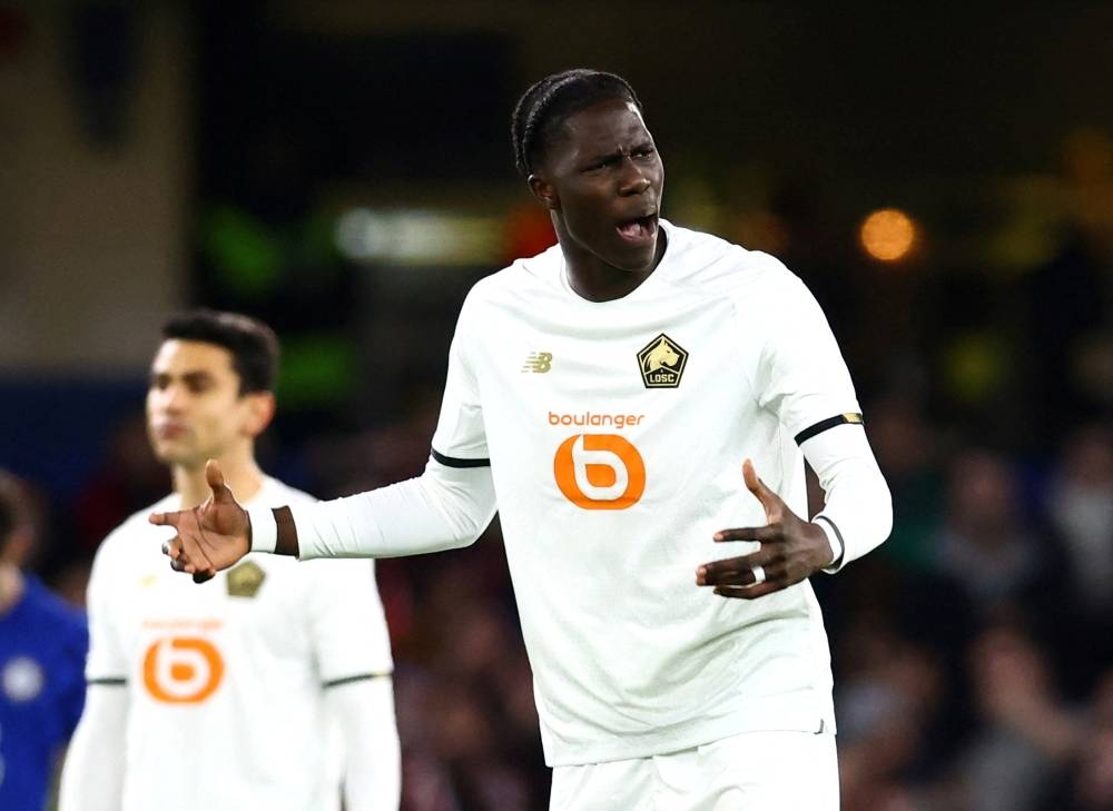Lille’s Amadou Onana looks dejected after Chelsea’s Kai Havertz scores their first goal at Stamford Bridge, London, Britain, February 22, 2022. — Reuters pic 