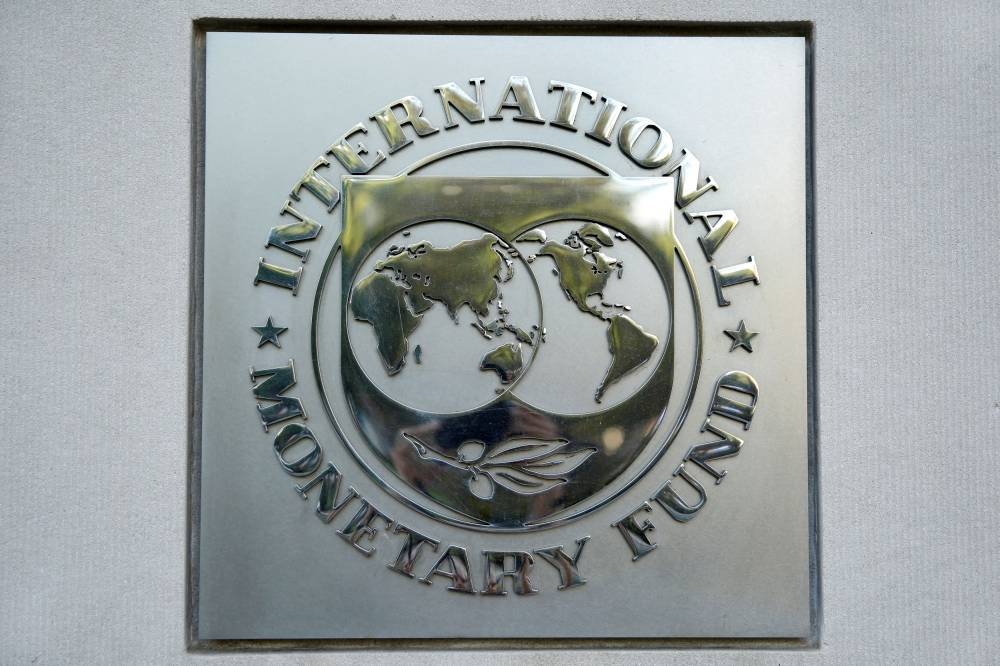 The International Monetary Fund logo is seen at the IMF headquarters building during the IMF/World Bank annual meetings in Washington October 14, 2017. — Reuters pic