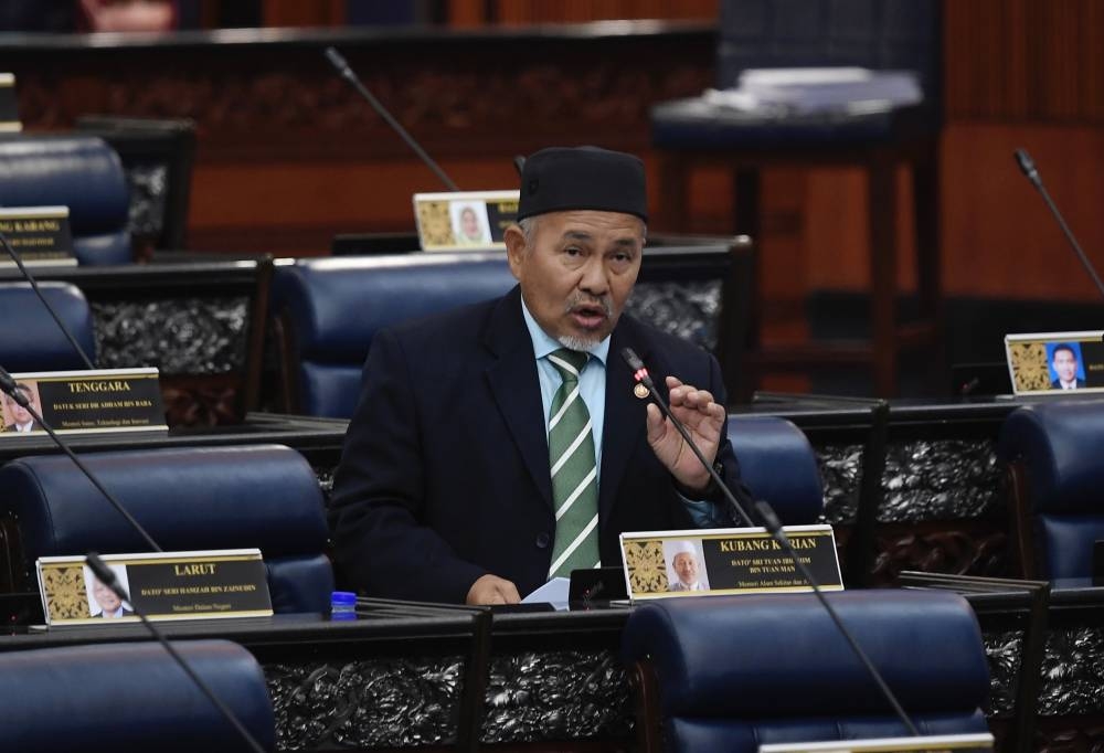 Datuk Seri Tuan Ibrahim Tuan Man addresses members of Parliament in Kuala Lumpur August 2, 2022. — Bernama pic