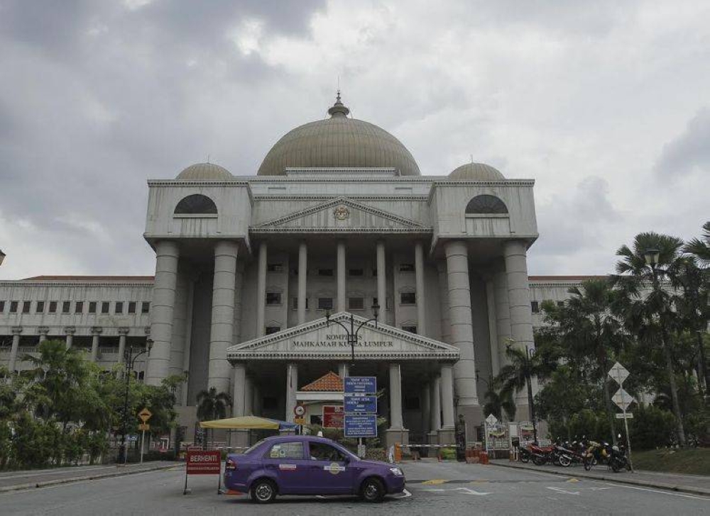The Sultanah is claiming general damages of RM100 million from each defendant and is also seeking an order for the publisher to withdraw the book containing the defamatory statement and for the printer to stop printing the book. — Picture by Yusof Mat Isa