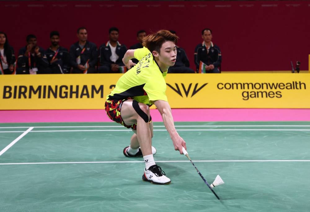 Malaysia’s Ng Tze Yong returns to India’s Srikanth Nammalwar Kidambi during the Mixed Team Gold Medal badminton match between Malaysia and India on day five of the Commonwealth Games at the NEC Arena in Birmingham, central England, August 2, 2022. — AFP pic 