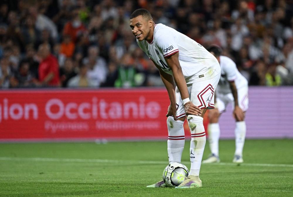 PSG announced that Kylian Mbappe had been left out of the squad that would travel to Clermont for tomorrow’s game ‘due to pain in his adductor muscles’ and will instead remain behind for treatment. — AFP pic 