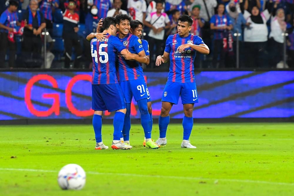 JDT’s Muhammad Syahmi Safari celebrates after scoring the sixth goal against Penang FC, August 5, 2022. ― Bernama pic
