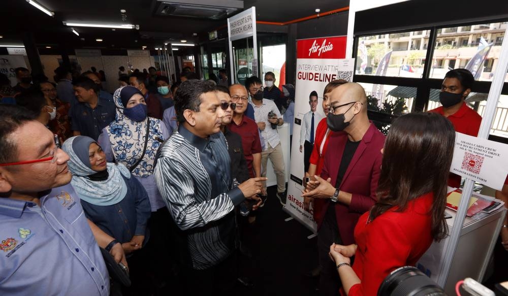 Deputy Tourism, Arts and Culture Minister Datuk Seri Santhara Kumar (centre) is seen while visiting the 2022 Tourism Career Fair at Dataran Sungai Melaka in Banda Hilir, Melaka August 6, 2022. — Bernama pic