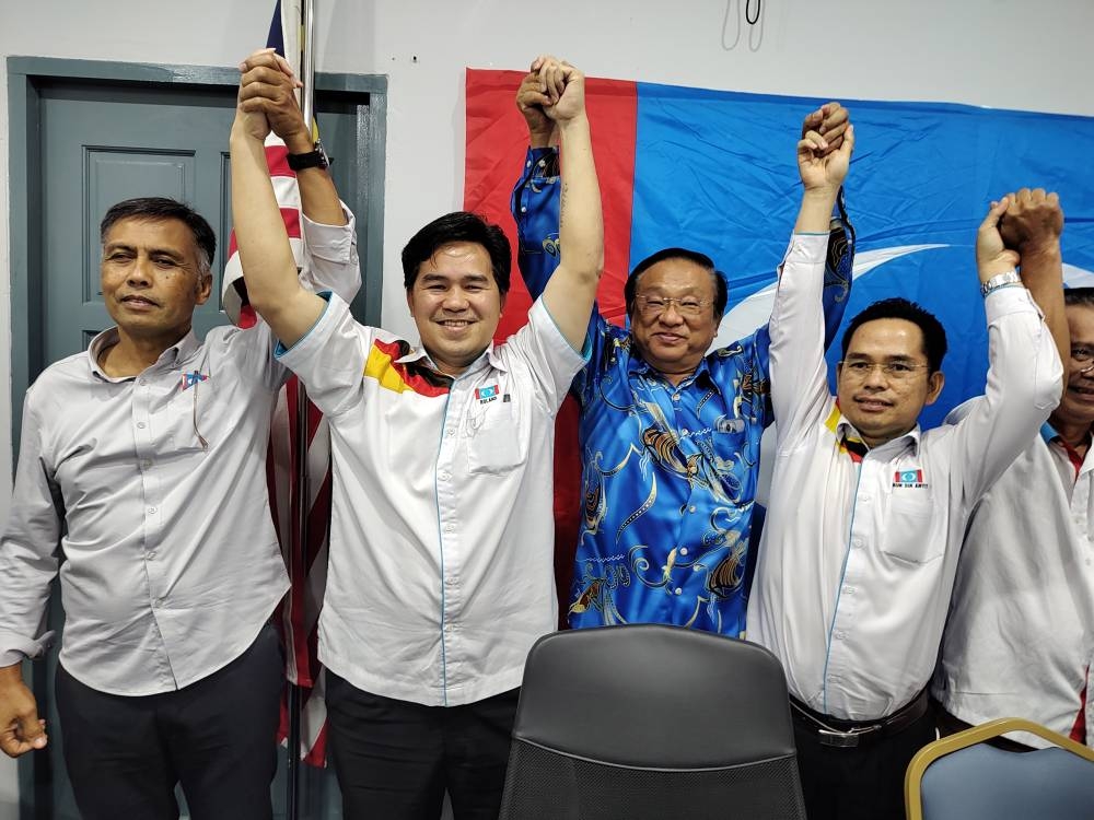 Sarawak PKR chairman Roland Engan (2nd left) with other state party leaders after his appointment was announced by party president Datuk Seri Anwar Ibrahim in Kuching August 6, 2022. — Picture by Sulok Tawie