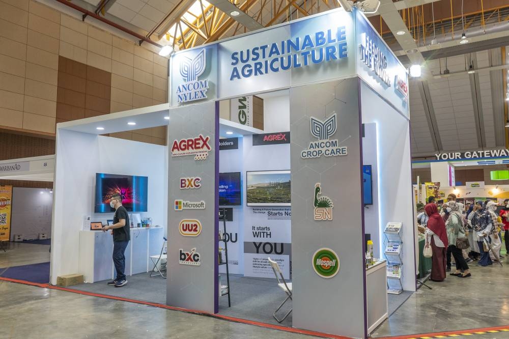 The Ancom booth is seen during the Malaysia Agriculture, Horticulture, and Agrotourism (Maha) 2022 expo at Malaysia Agro Exposition Park Serdang (MAEPS) in Serdang August 6. 2022. — Picture by Shafwan Zaidon