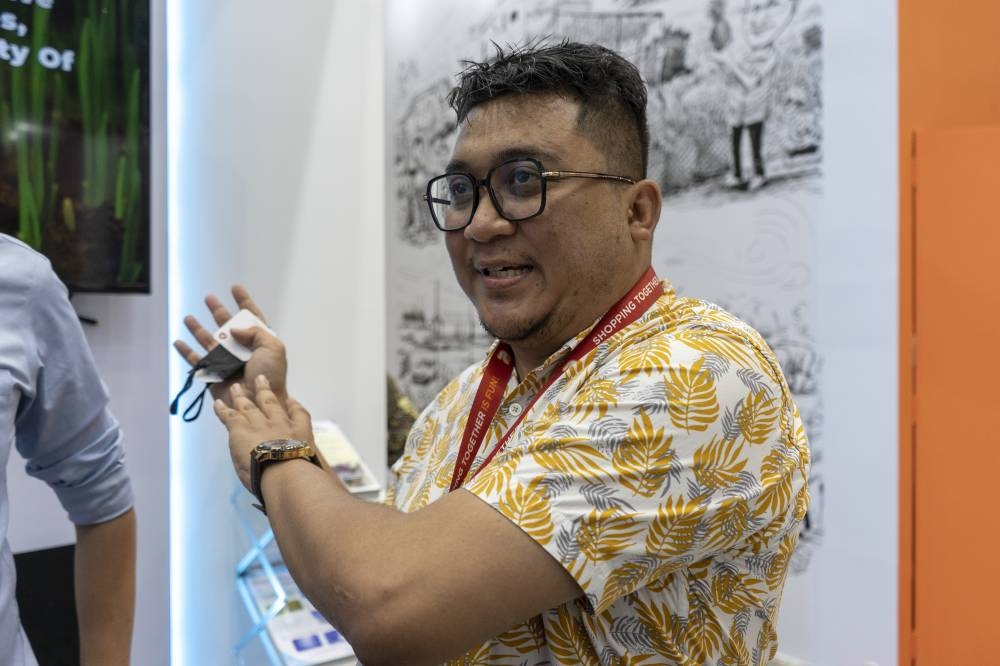 UU2 business development director Nashriq Yazid speaks to Malay Mail during the Malaysia Agriculture, Horticulture, and Agrotourism (Maha) 2022 expo at Malaysia Agro Exposition Park Serdang (MAEPS) in Serdang August 6. 2022. — Picture by Shafwan Zaidon