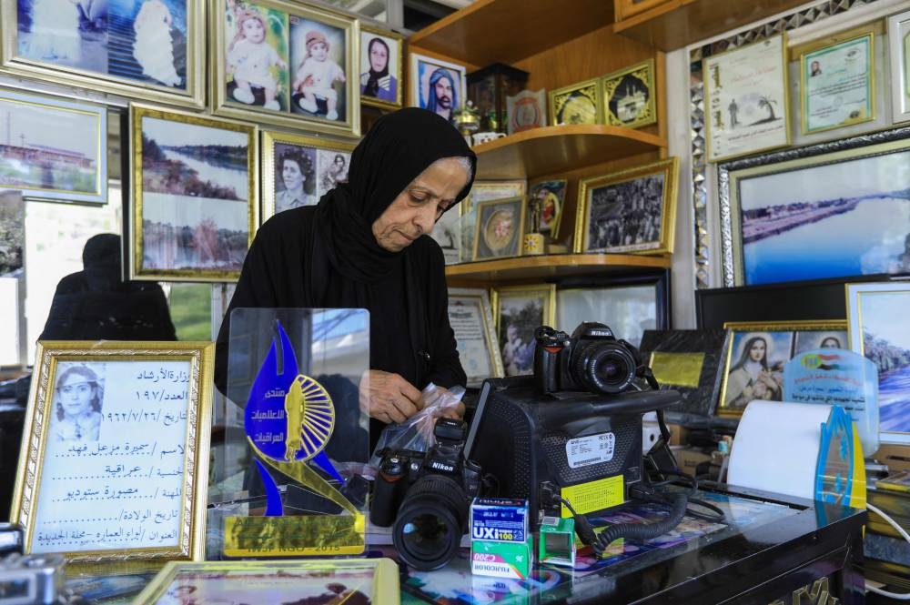 Iraqi photographer Samira Mazaal speaks during an interview at her studio in the city of Amarah in Iraq’s southeastern Maysan province. — ETX Studio pic