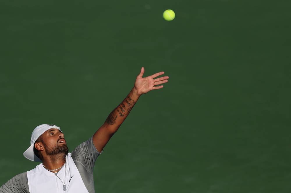 Nick Kyrgios of Australia serves a shot to Yoshihito Nishioka of Japan in their Men's Singles Final match during Day 9 of the Citi Open at Rock Creek Tennis Center on August 7, 2022 in Washington, DC. — Patrick Smith/Getty Images/AFP pic