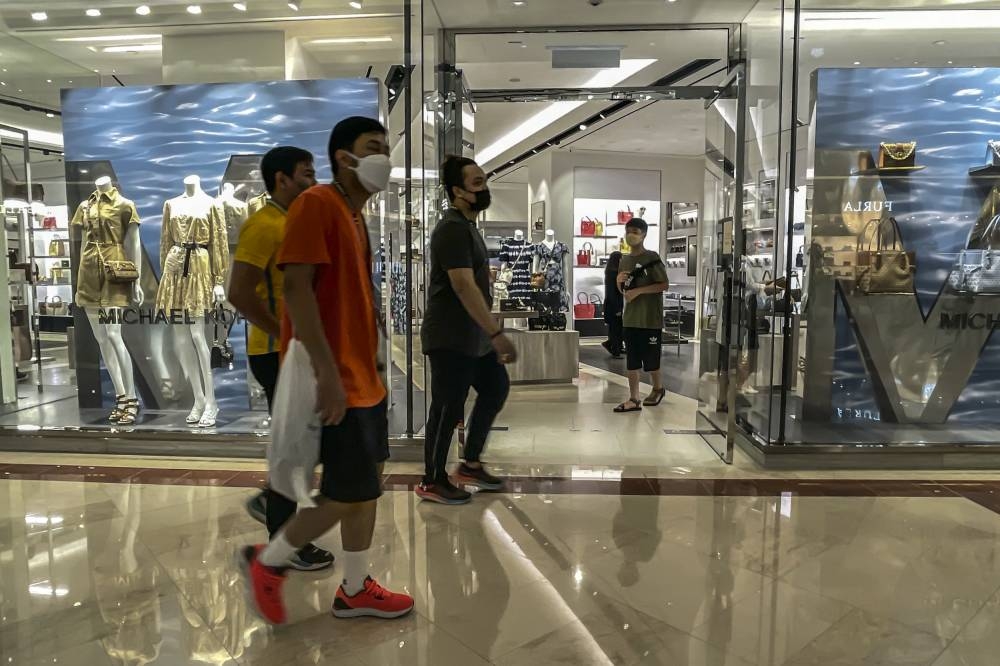 Thirty-seven per cent of Malaysians said they would spend less on shopping. — Picture by Hari Anggara