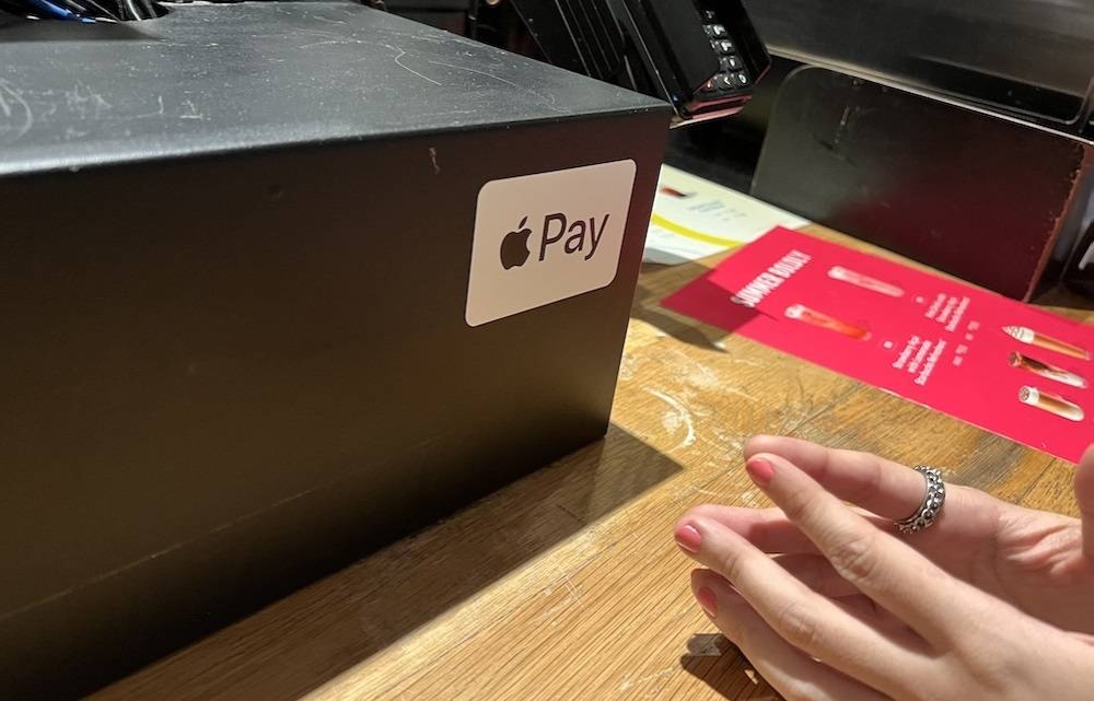While stores with the Apple Pay logo will be guaranteed to work with it, I found stores without the logo accepted it easily too. — Picture by Erna Mahyuni