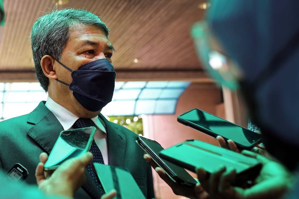 BN deputy chairman Datuk Seri Mohamad Hasan speaking to reporters after attending the Negri Sembilan state assembly sitting in Seremban August 9, 2022. — Bernama pic