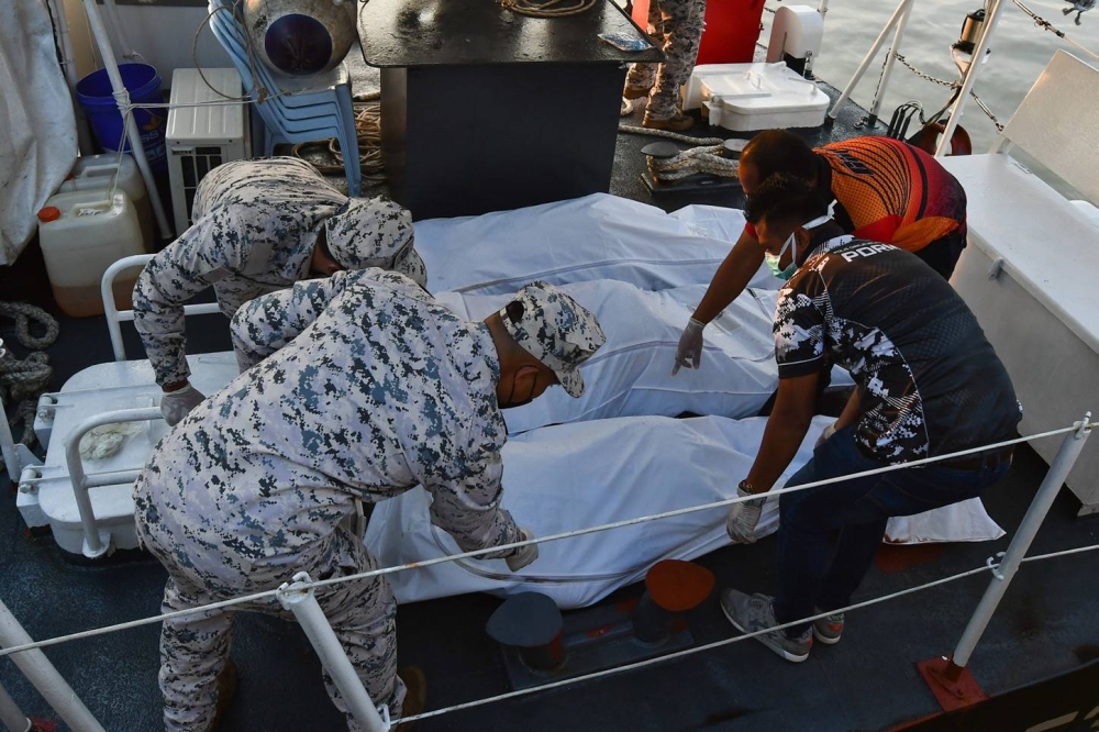 The bodies of the three victims were found in different locations around 1.7 to 1.9 nautical miles from Redang Island. — Bernama pic  